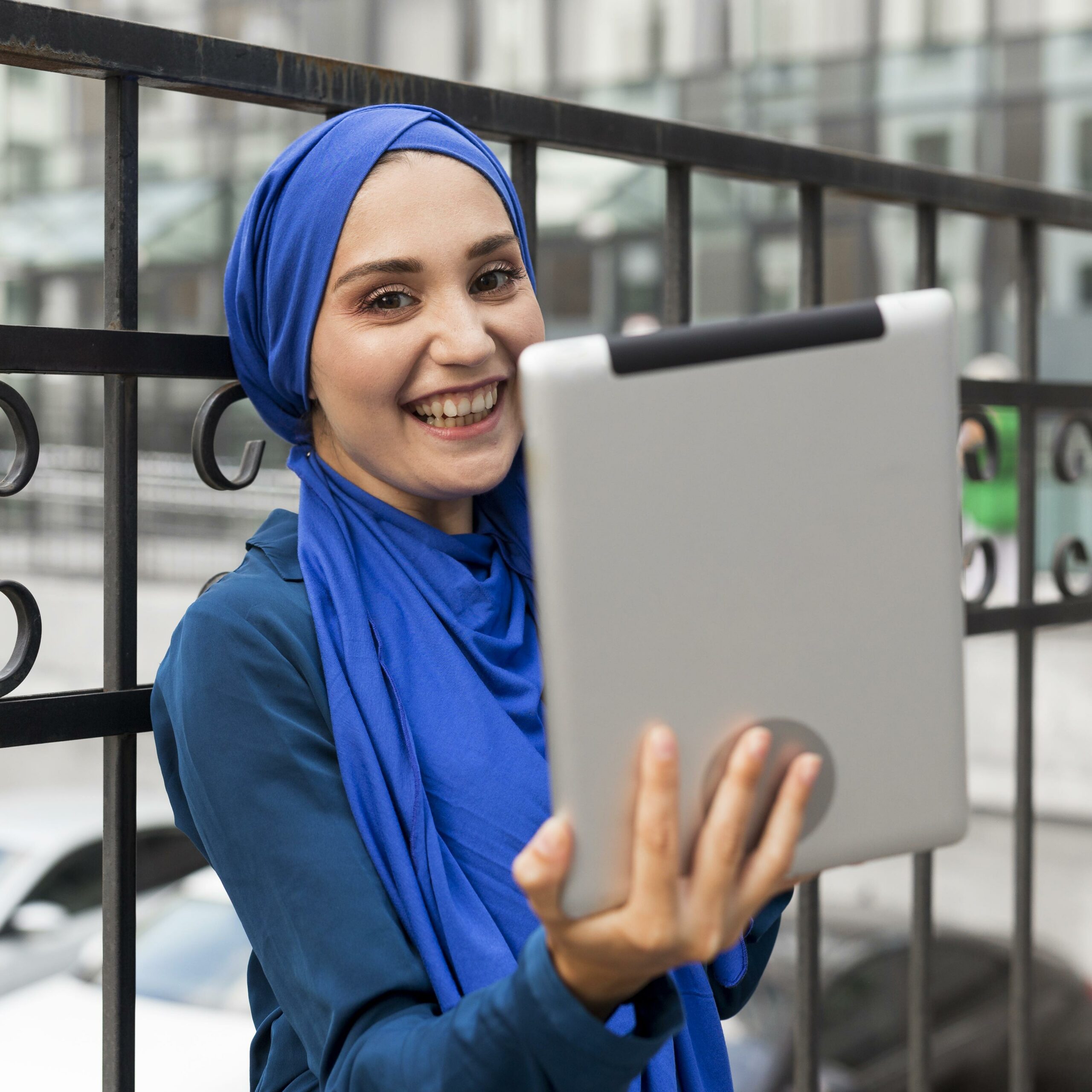 teenager girl looking her tablet scaled